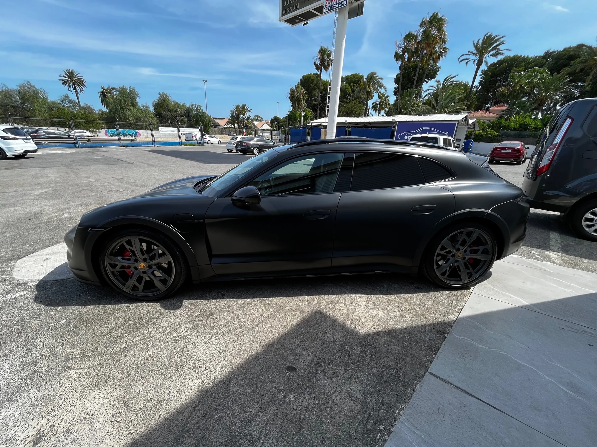 Porsche Taycan negro mate wrapping profesional Alicante